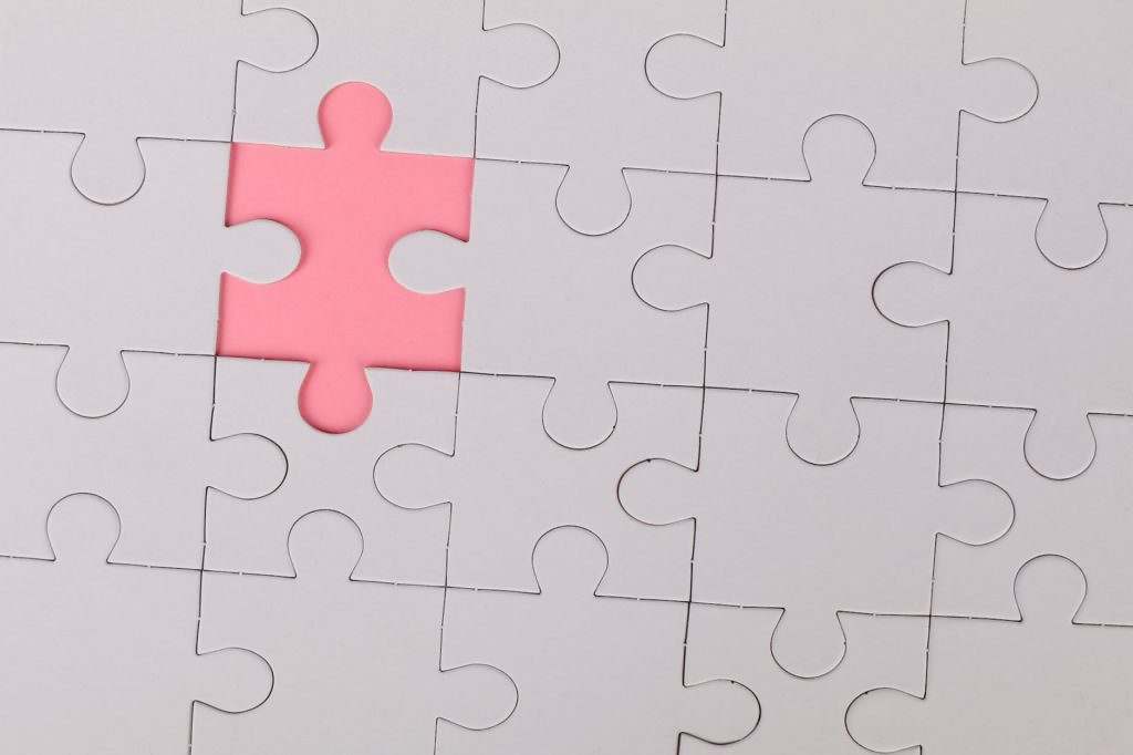 pink jigsaw puzzle piece