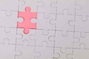 pink jigsaw puzzle piece